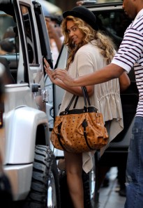 Beyonce Knowles follows husband Jay-Z into their waiting SUV in the SoHo neighborhood of New York City