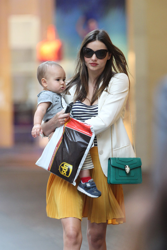 Miranda Kerr takes Flynn along for a business meeting in Sydney