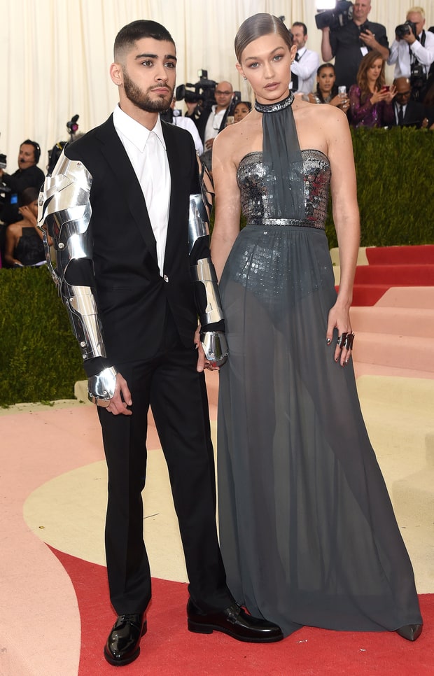 Gigi Hadid in Tommy Hilfiger with Zayn Malik in Versace