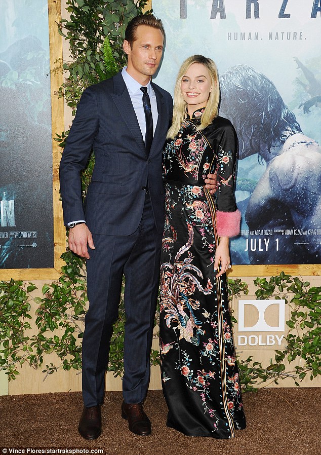 Margot Robbie in Gucci Fall 2016 with Alexander Skarsgard